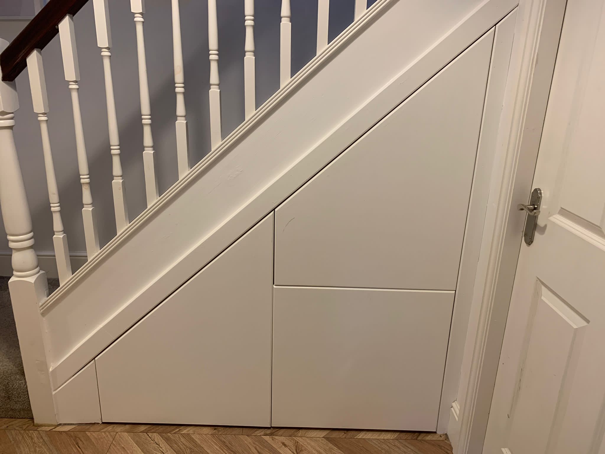 Under stair storage with pull out drawers